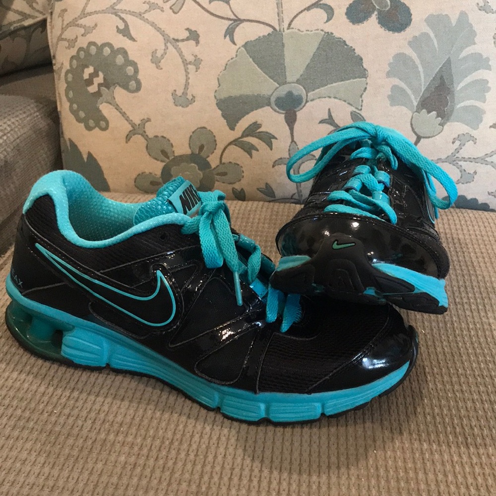 Blue and black nike shoes